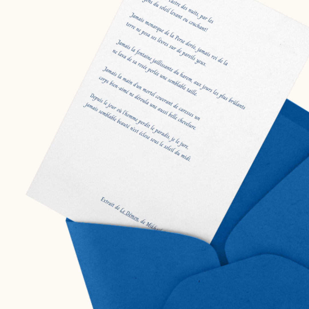 Blue envelope with a letter sticking out of it.